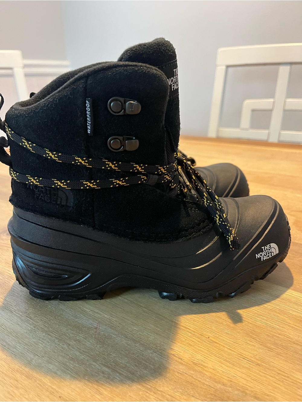 The North Face Black Boots with Yellow-Accent Laces